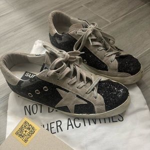 Golden Goose 39 Superstar shoes.